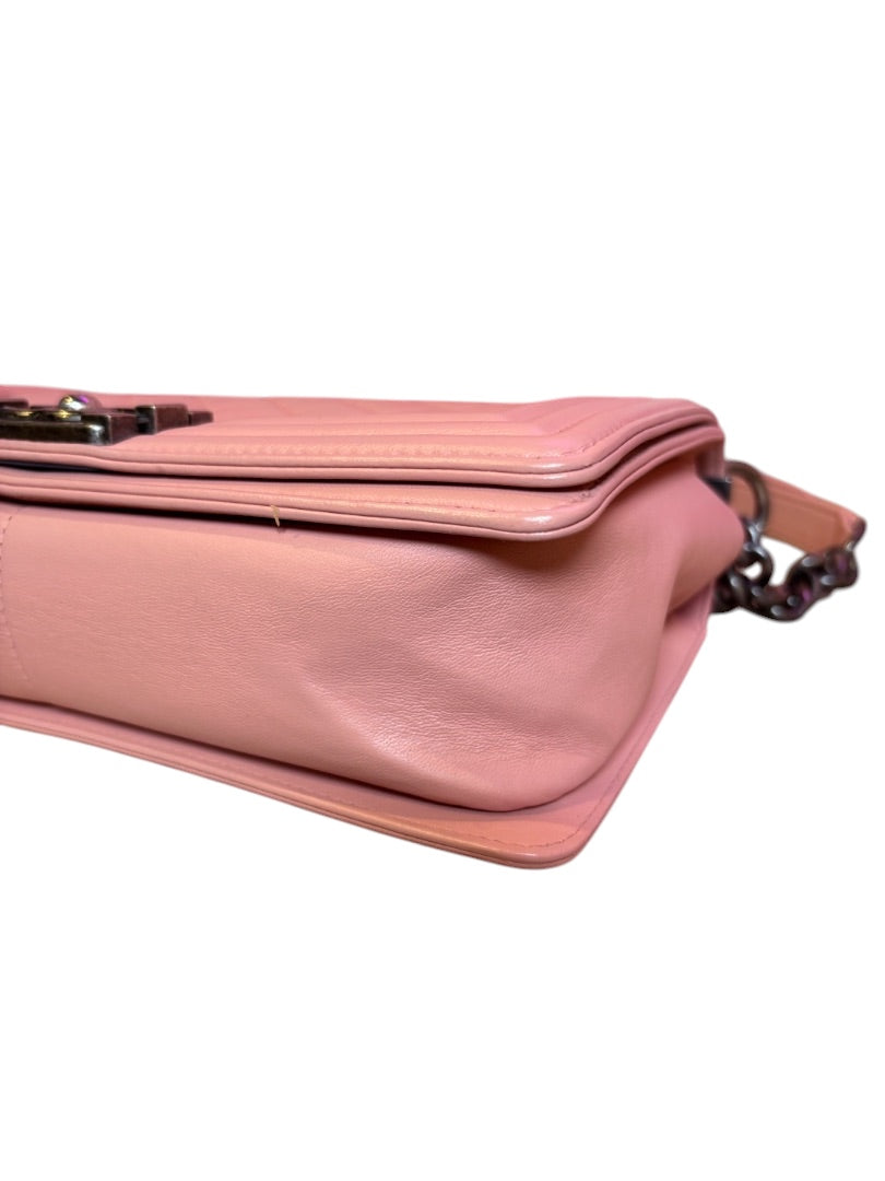 Posh Purse Co. pink leather Chanel Boy Bag, medium size, with quilted stitching and antique-style hardware.