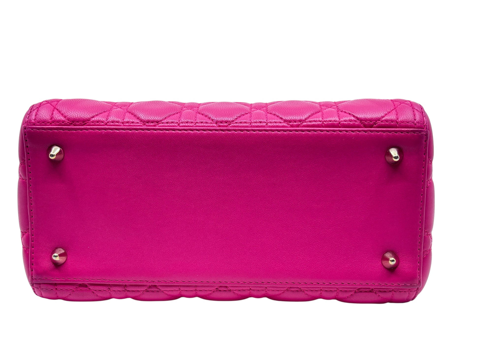Posh Purse Co pink medium Lady Dior bag base featuring protective metal feet and signature Cannage quilting
