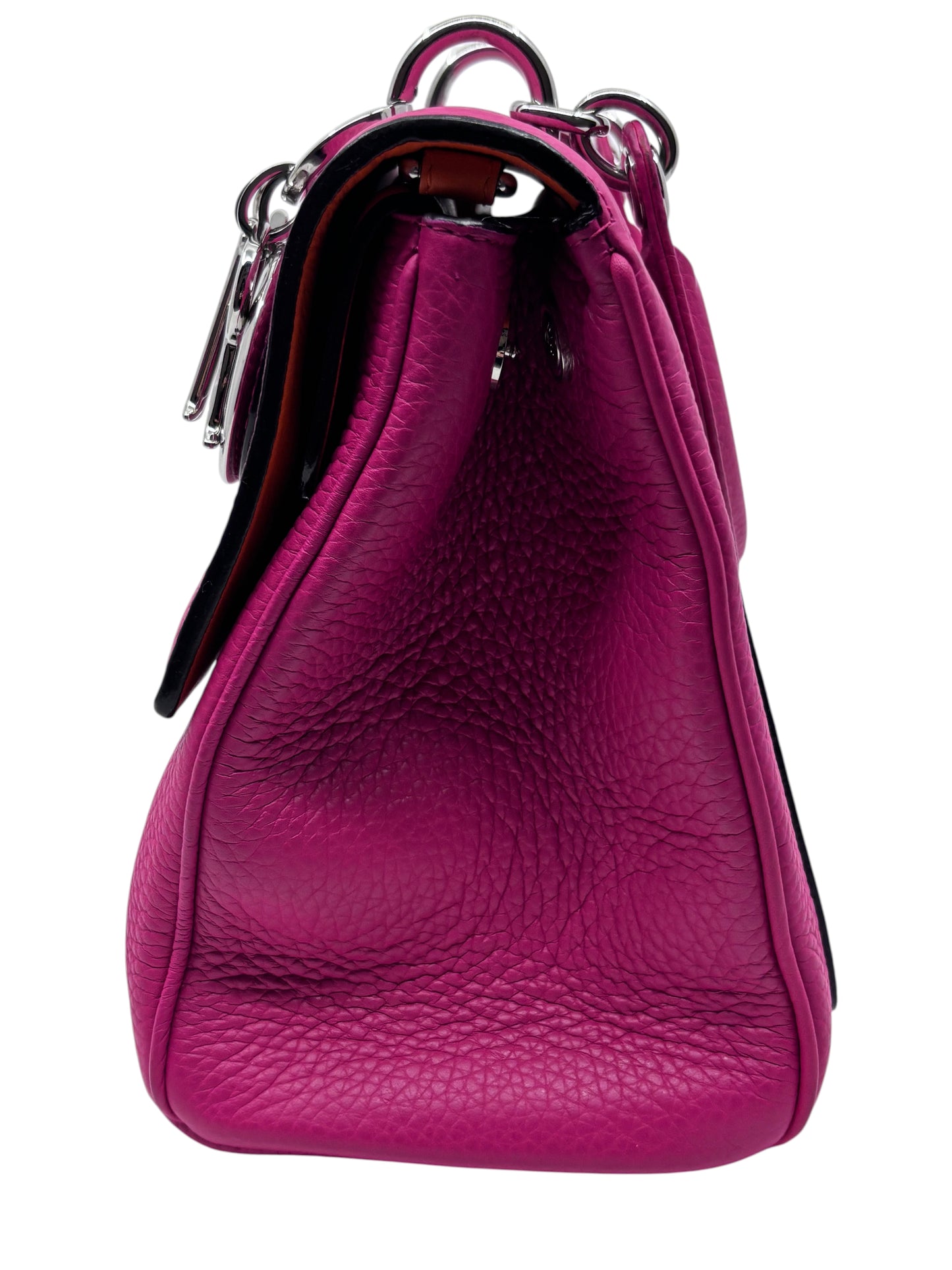 Posh Purse Co. pink leather Dior Be Dior handbag side profile showing textured grain and silver hardware details.