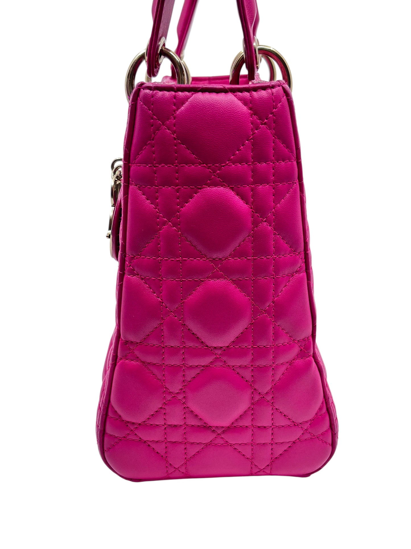 Side view of a pink medium Posh Purse Co Lady Dior bag featuring signature Cannage quilting and polished metal hardware.