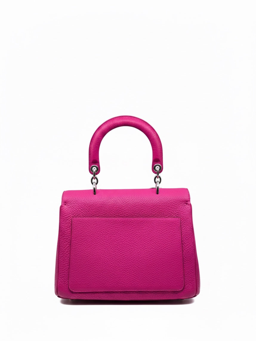 Posh Purse Co. pink leather Christian Dior Be Dior handbag, back view showing structured handle and exterior pocket.