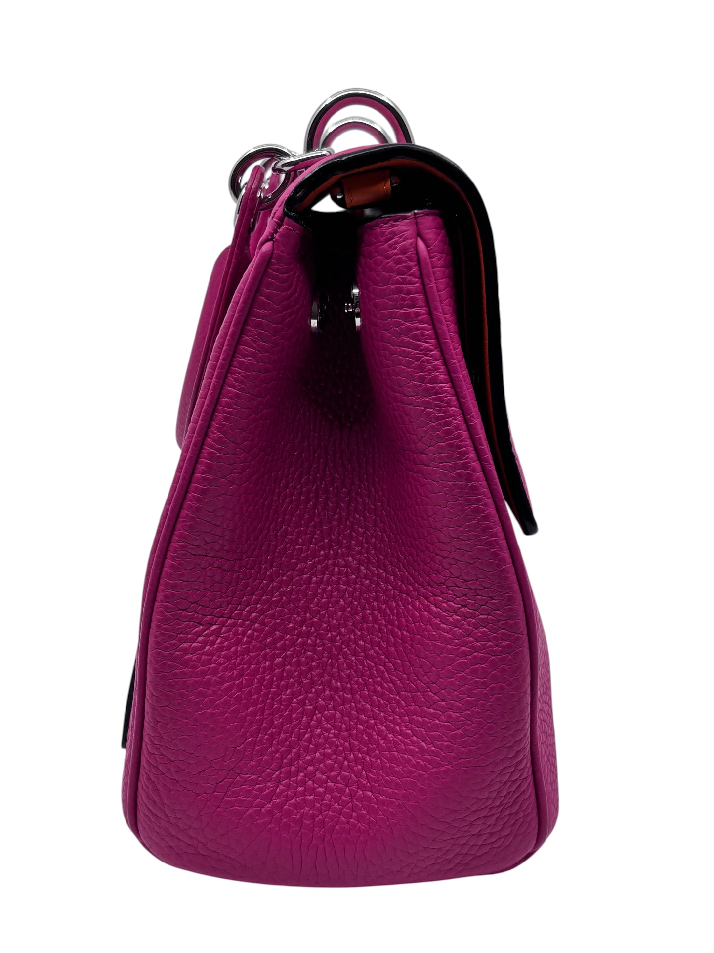Side view of a pink pebbled leather Christian Dior Be Dior bag with polished hardware from Posh Purse Co.