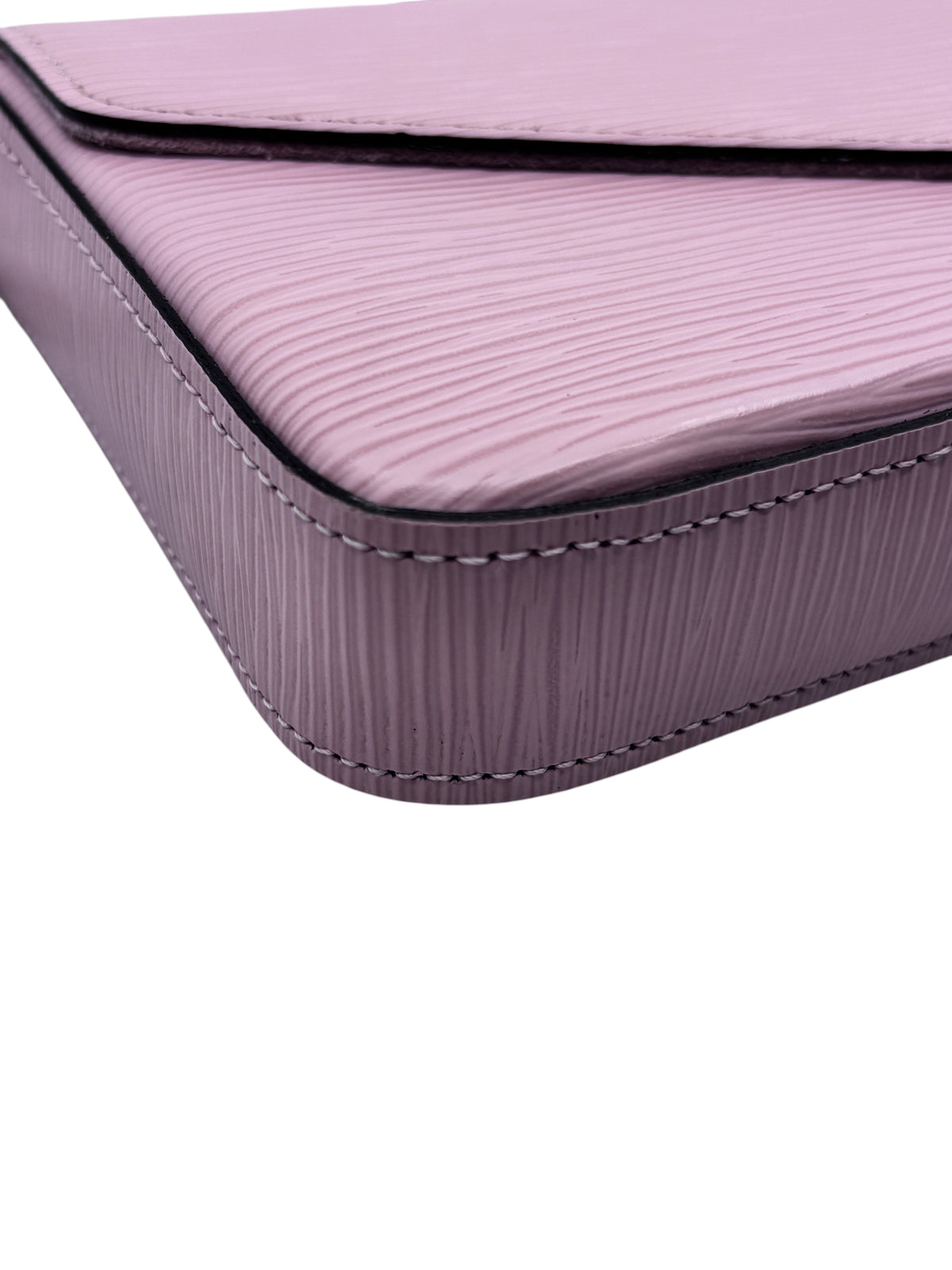 Close-up of Posh Purse Co pink Louis Vuitton Epi leather Pochette Felicie showing textured grain and stitching detail
