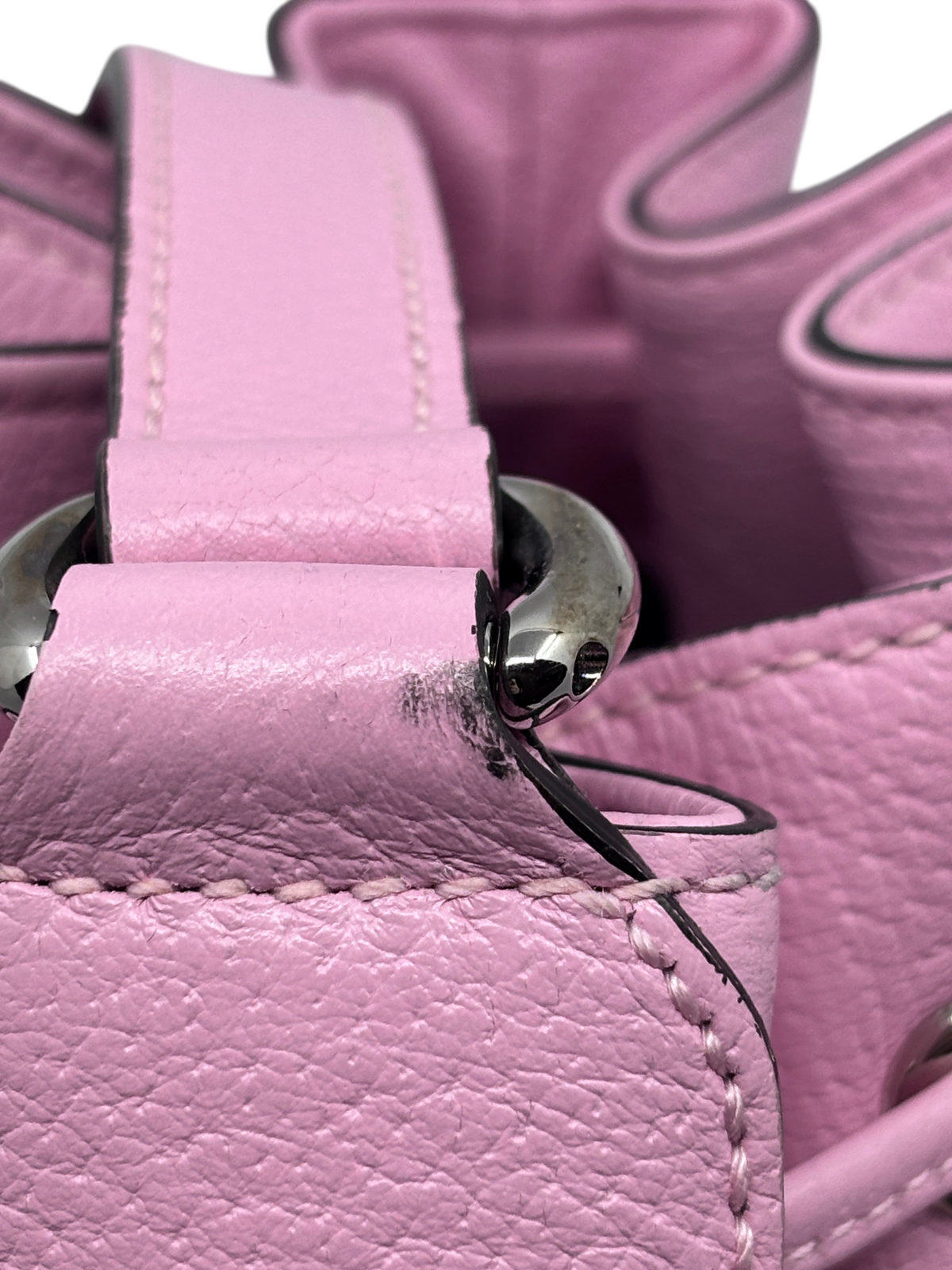 Close-up of pink leather Gucci GG Psychedelic bucket bag hardware and stitching from Posh Purse Co.