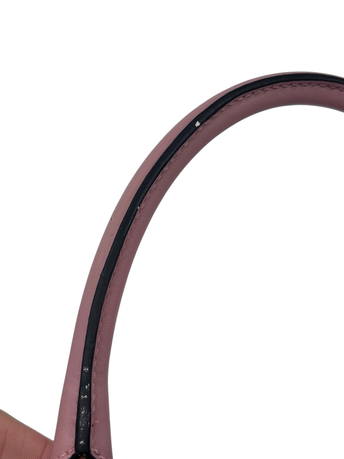 Posh Purse Co pink Gucci Micro Guccissima handbag handle showing minor scuffs and wear on the leather edge