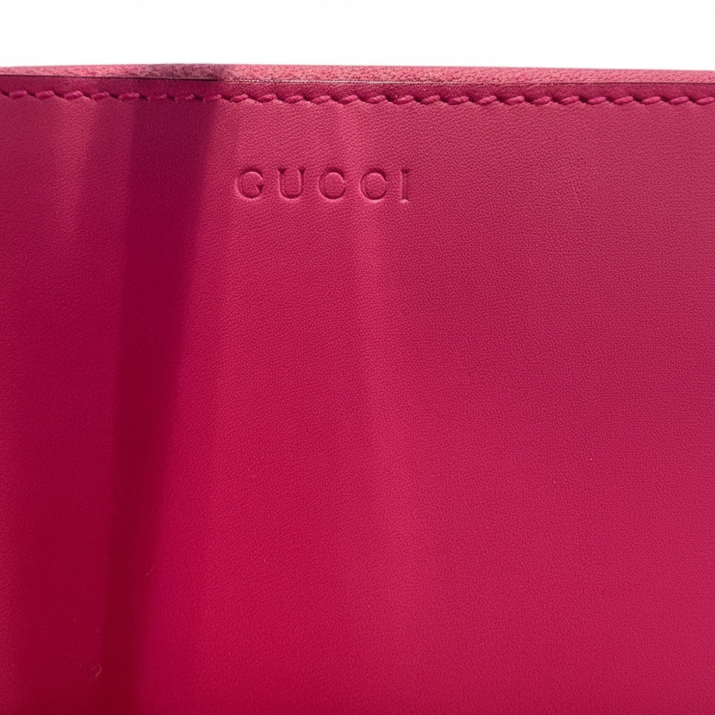 Posh Purse Co pink calfskin leather Gucci zip around wallet with gold hardware.