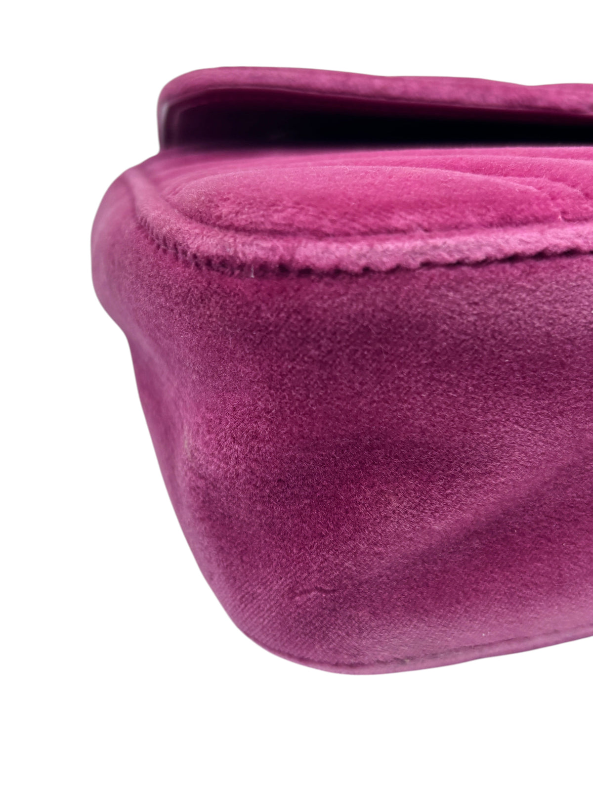 Close-up of the pink velvet exterior of a Posh Purse Co Gucci Marmont shoulder bag showing soft texture and stitching
