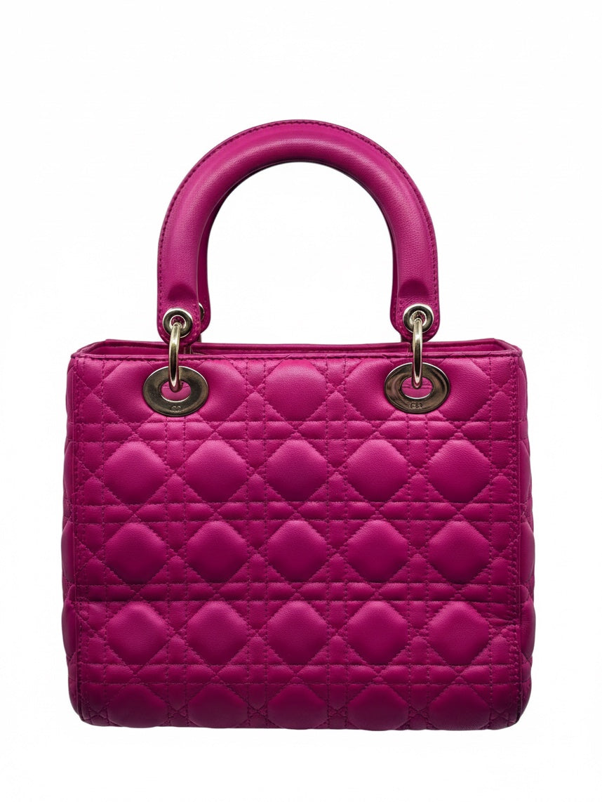 Posh Purse Co medium Pink Lady Dior bag featuring signature Cannage quilting, rounded top handles, and metal hardware.
