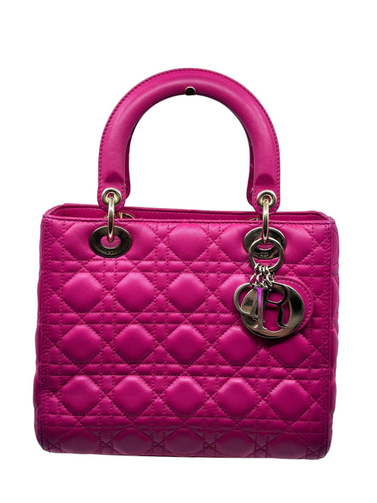 Posh Purse Co medium pink Lady Dior bag with signature Cannage quilting, rounded handles, and silver DIOR charms.