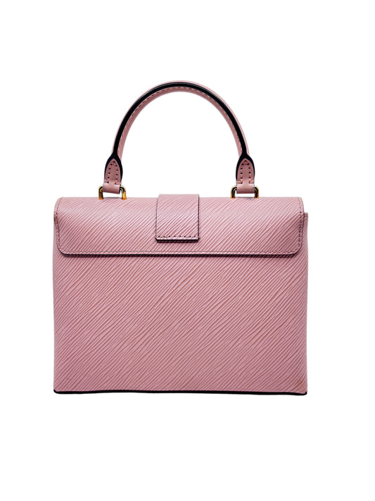 Posh Purse Co. preloved pink Louis Vuitton Locky handbag with structured silhouette and textured leather finish
