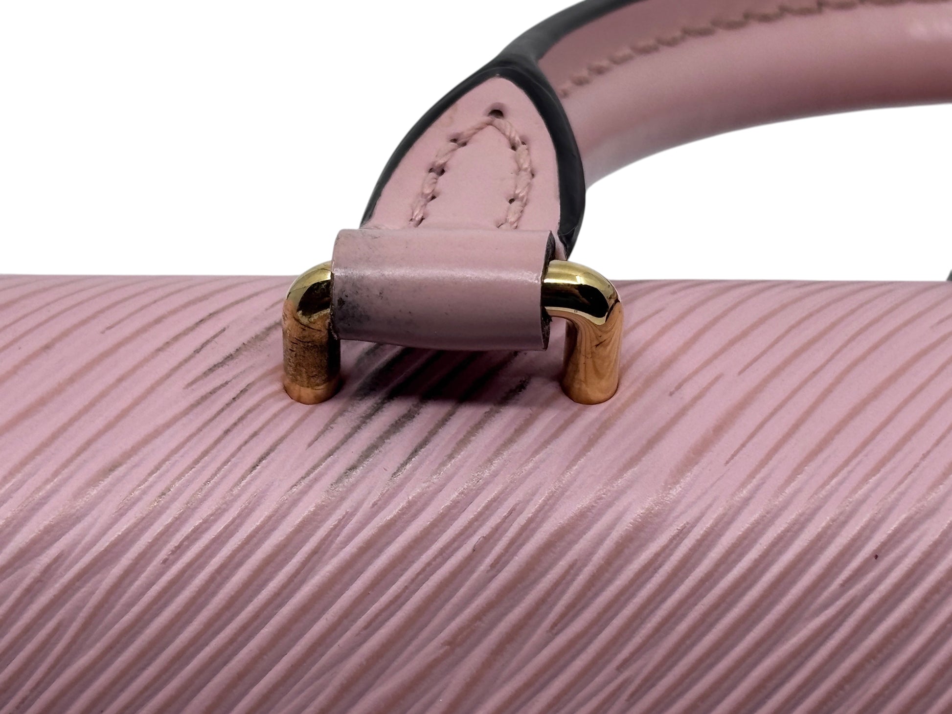 Posh Purse Co. pink Louis Vuitton Locky handbag handle attachment showing textured Epi leather and gold hardware