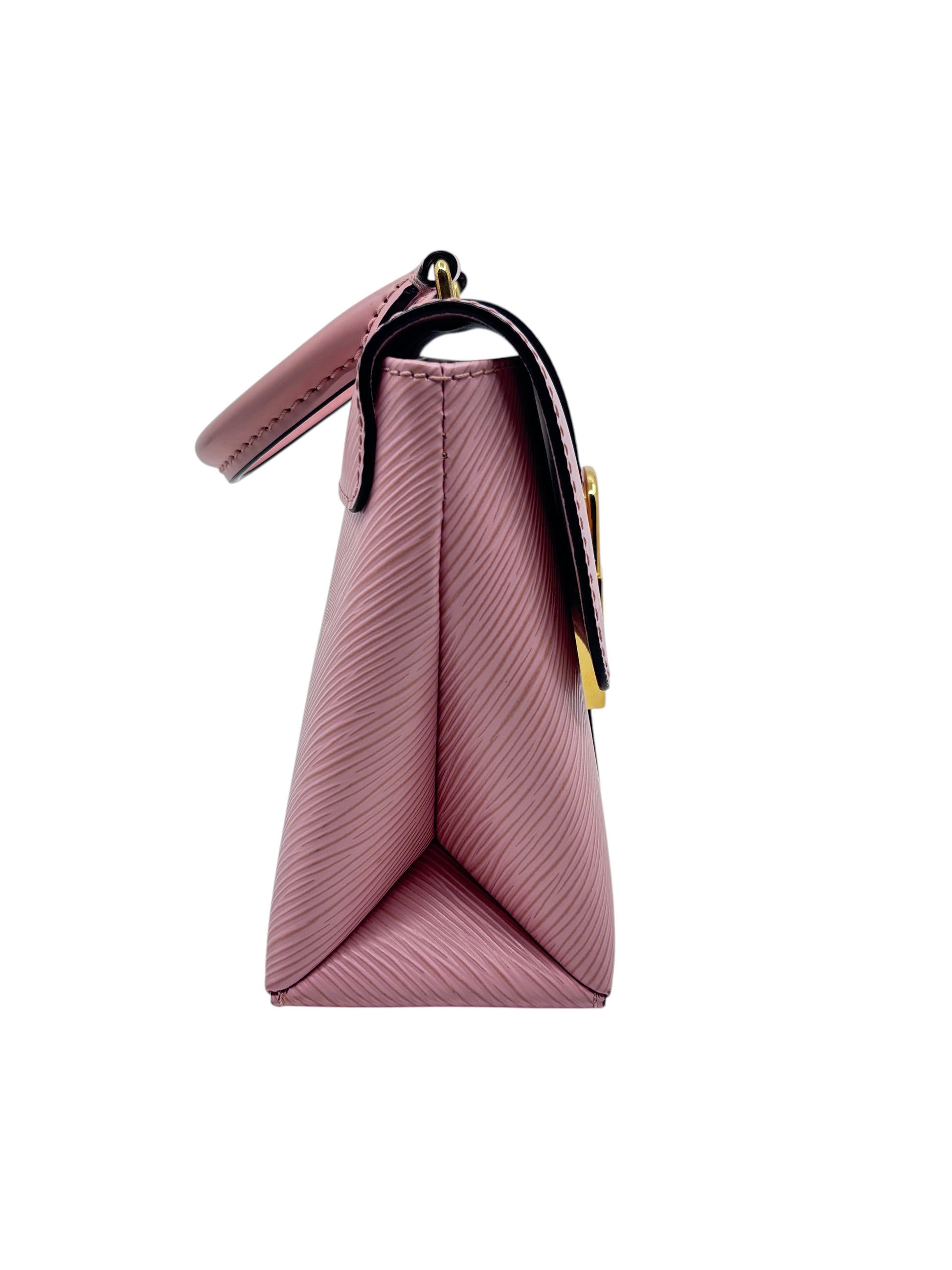 Side view of a pink Posh Purse Co. Louis Vuitton Locky handbag with textured leather and gold hardware.