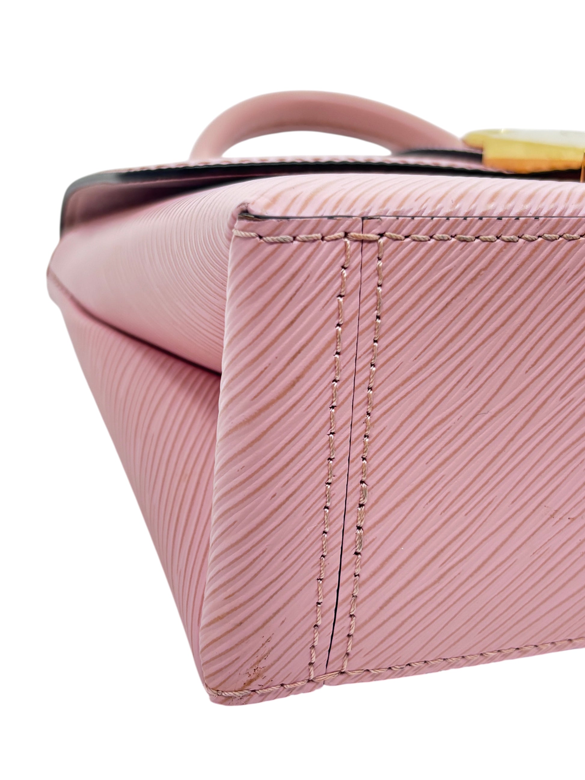 Posh Purse Co. pink Louis Vuitton Locky handbag featuring signature textured Epi leather and structured side profile.