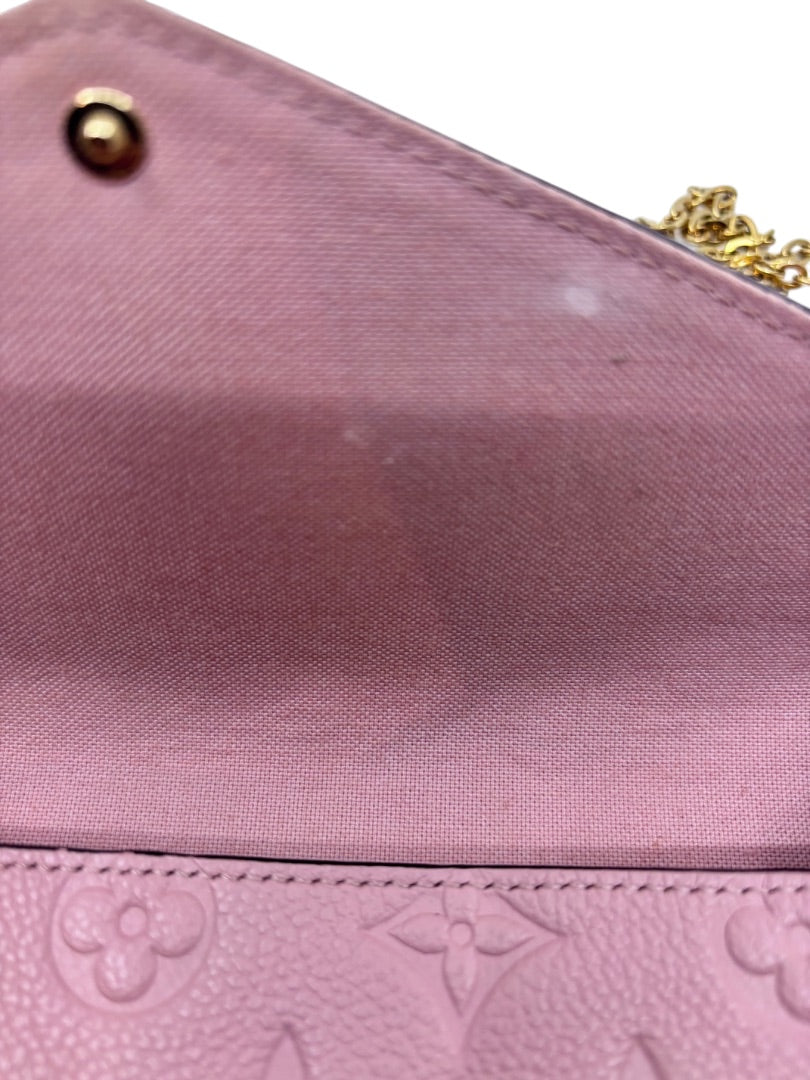 Posh Purse Co pink Louis Vuitton Empreinte Pochette Felicie interior flap with monogram leather and snap closure
