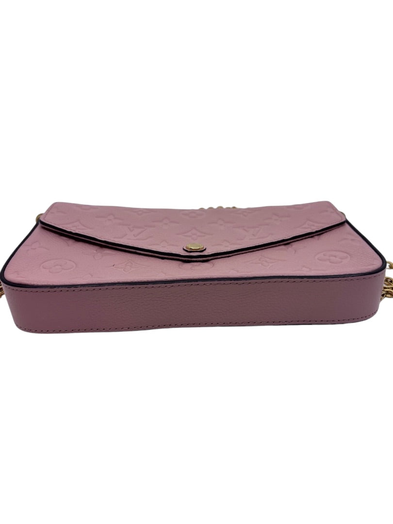 Posh Purse Co pink Louis Vuitton Empreinte Pochette Felicie envelope bag with gold hardware and embossed monogram