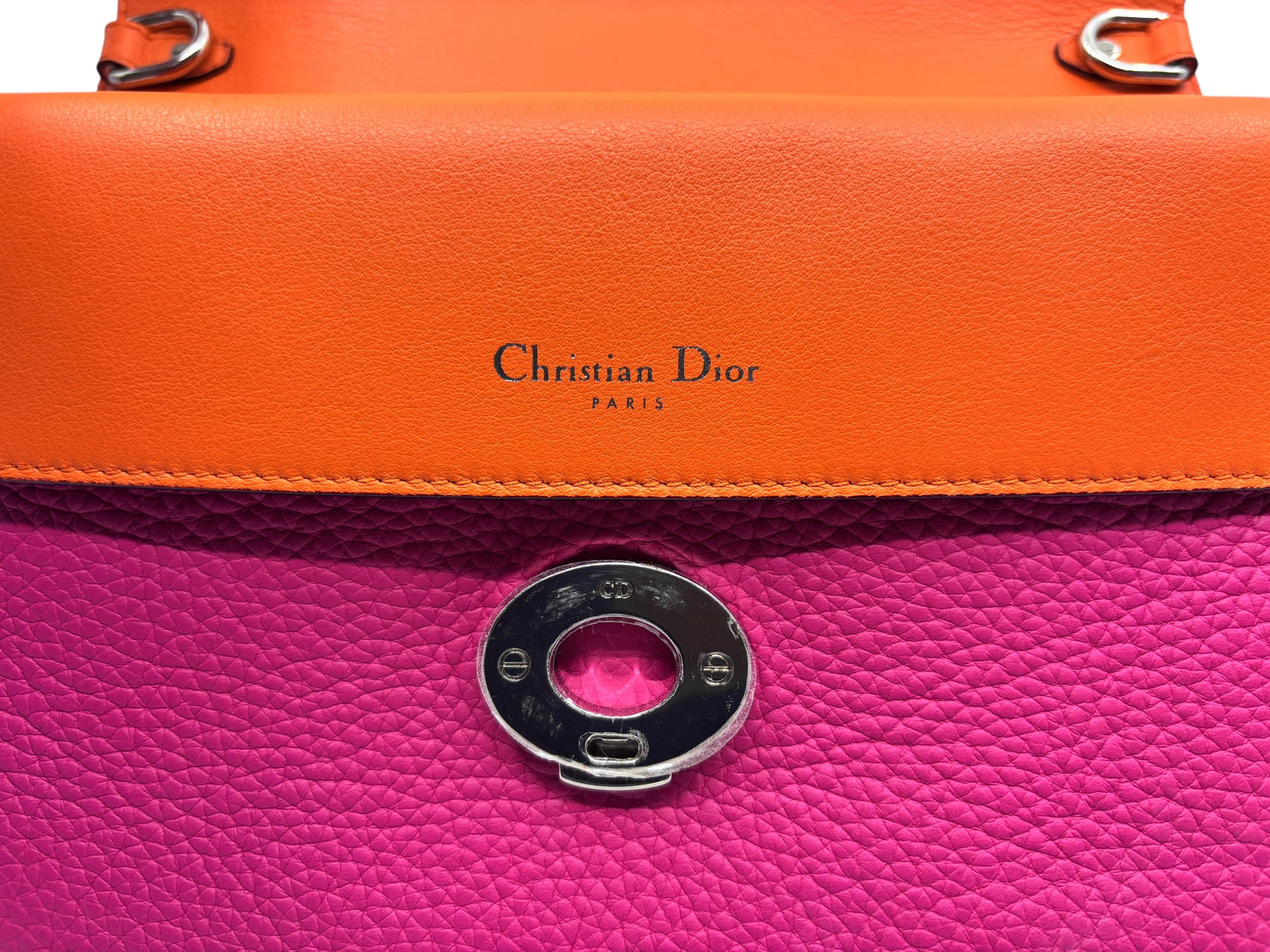Posh Purse Co. Christian Dior Be Dior leather handbag in vibrant pink and orange with silver hardware detail.