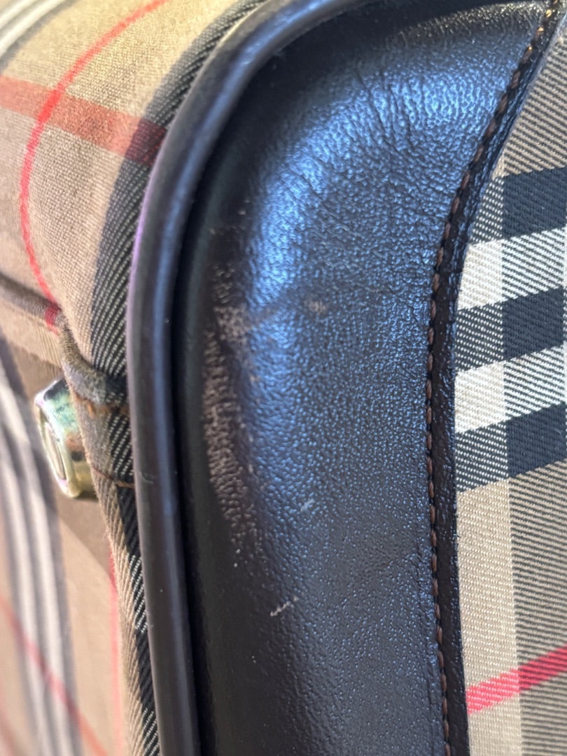 Posh Purse Co. Classic Plaid Weekend Duffle Bag in beige, black, red, and white plaid with dark brown leather trim.