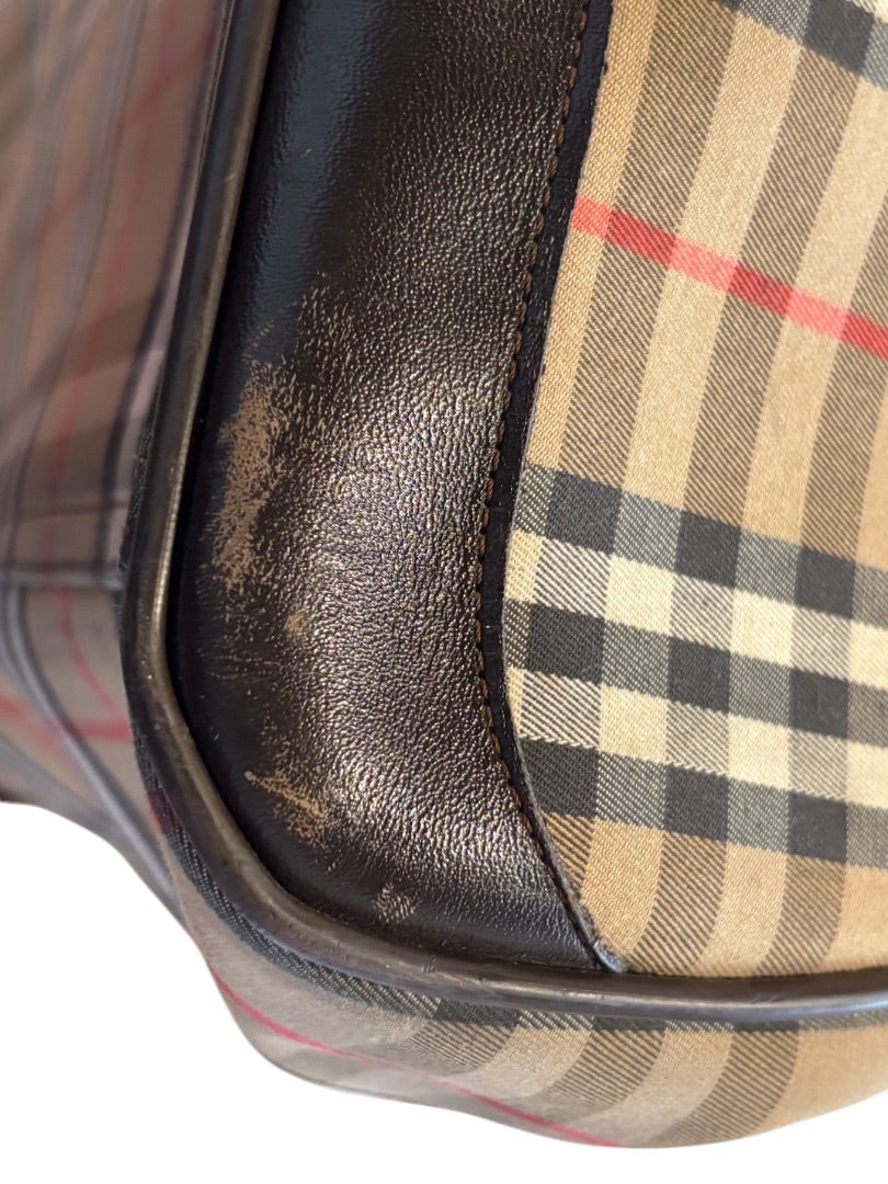 Posh Purse Co. Classic Plaid Weekend Duffle Bag in beige, black, red, and white plaid with dark brown leather trim.