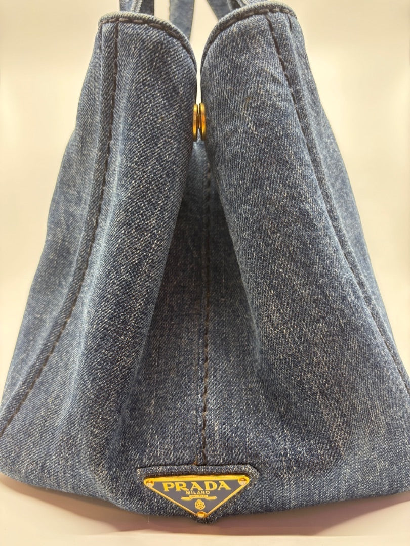 Posh Purse Co Prada Avio blue denim tote bag with gold hardware and triangle logo.