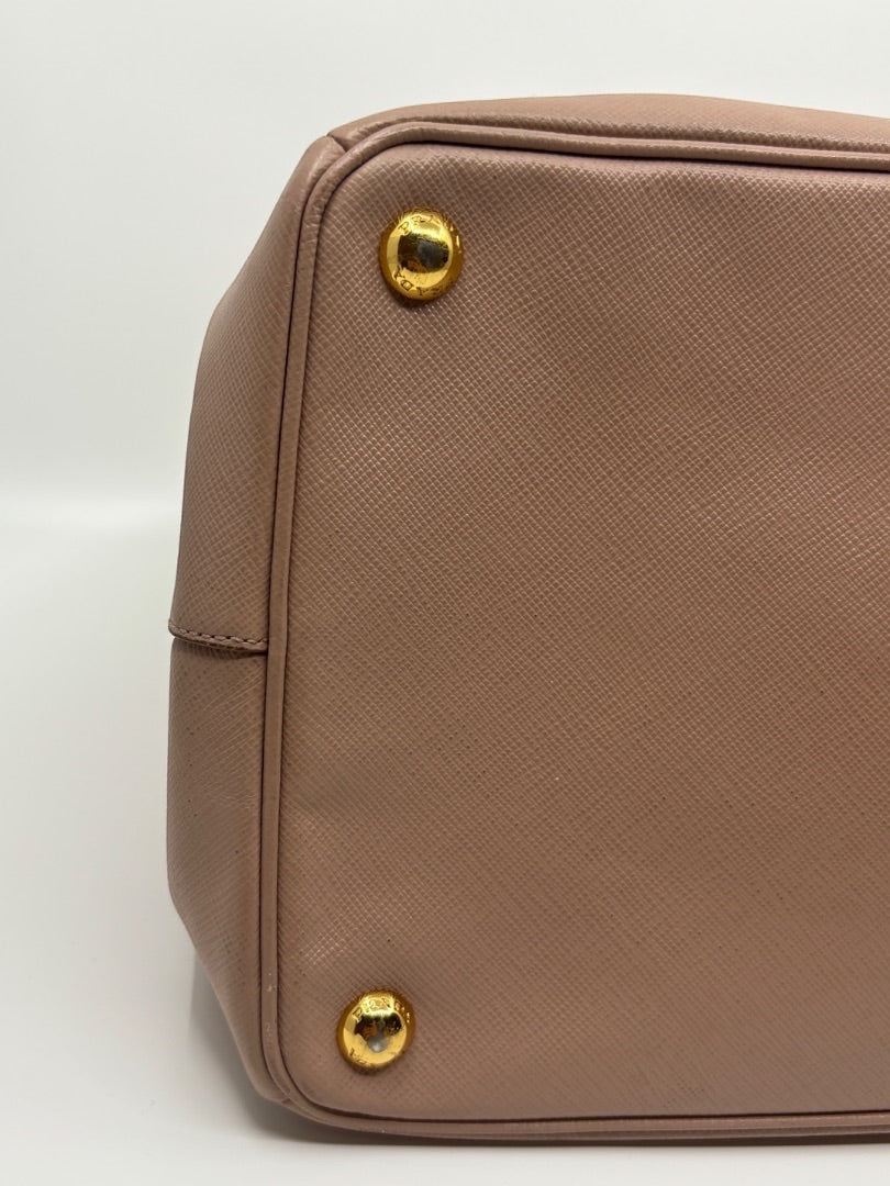Posh Purse Co. blush pink Saffiano leather Prada tote with gold hardware. Large designer handbag for everyday use.