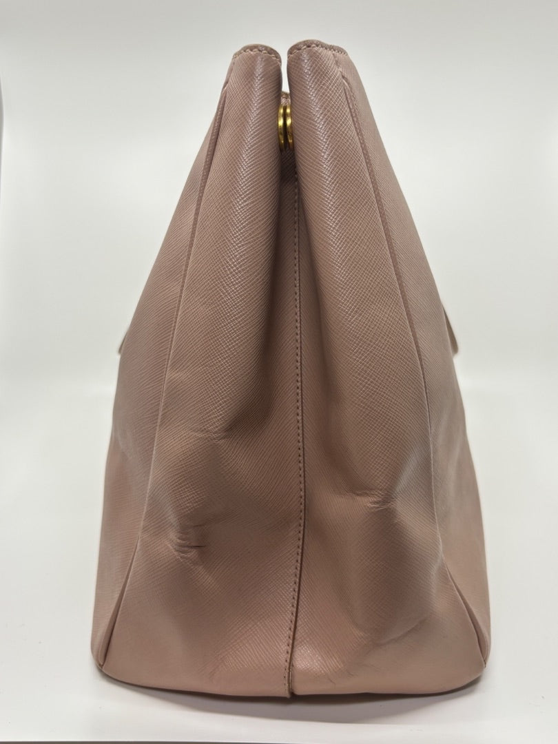 Posh Purse Co. Large Blush Prada Tote, a preloved designer handbag in soft pink Saffiano leather with gold hardware.