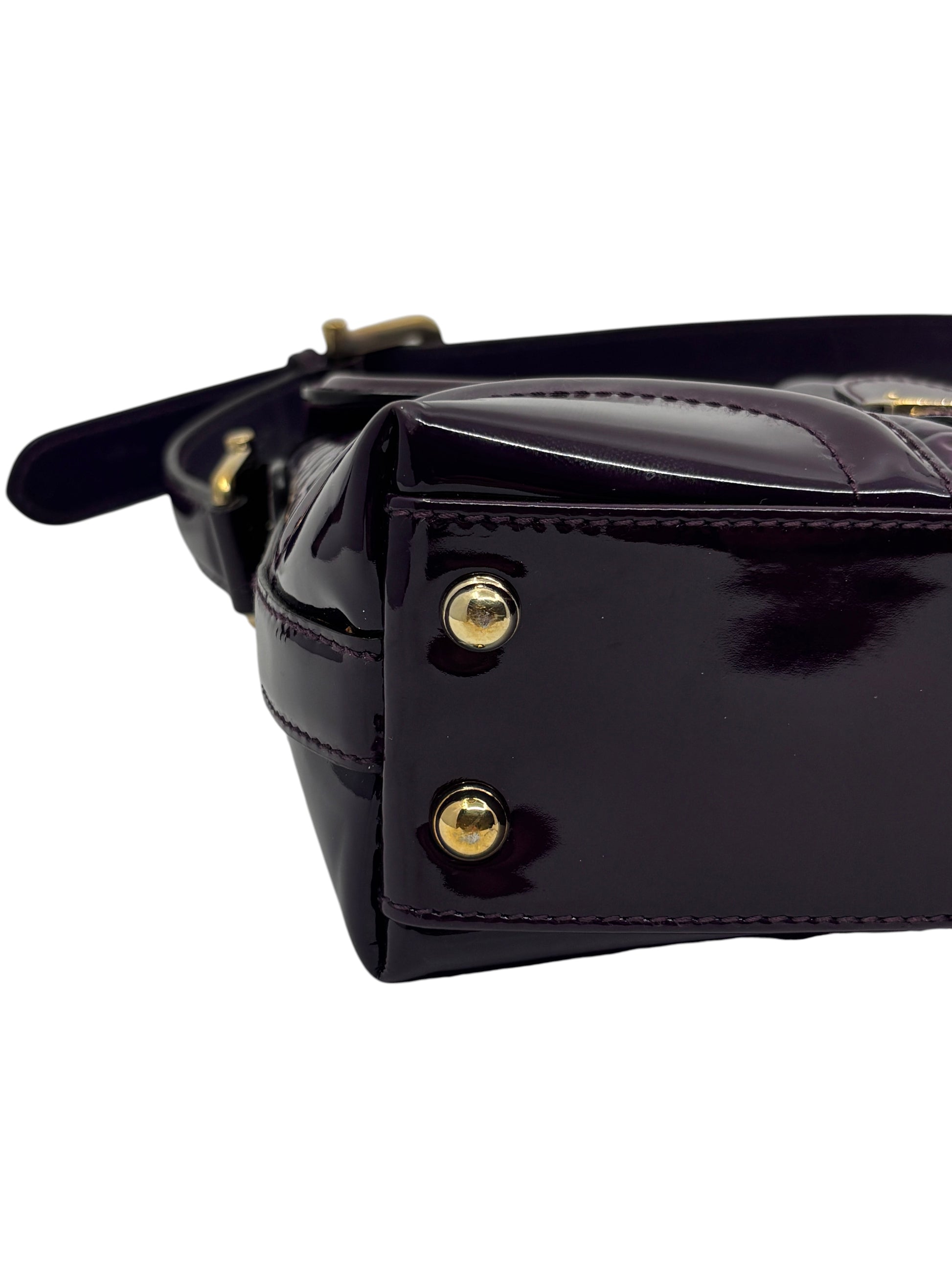 Posh Purse Co. preloved purple patent leather Gucci Horsebit Treasure bag base with gold-tone protective feet