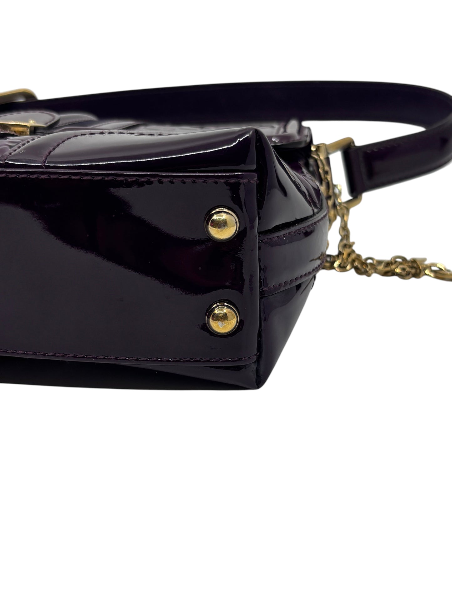 Posh Purse Co purple patent leather Gucci Horsebit Treasure Bag featuring gold-tone metal feet and chain detail.