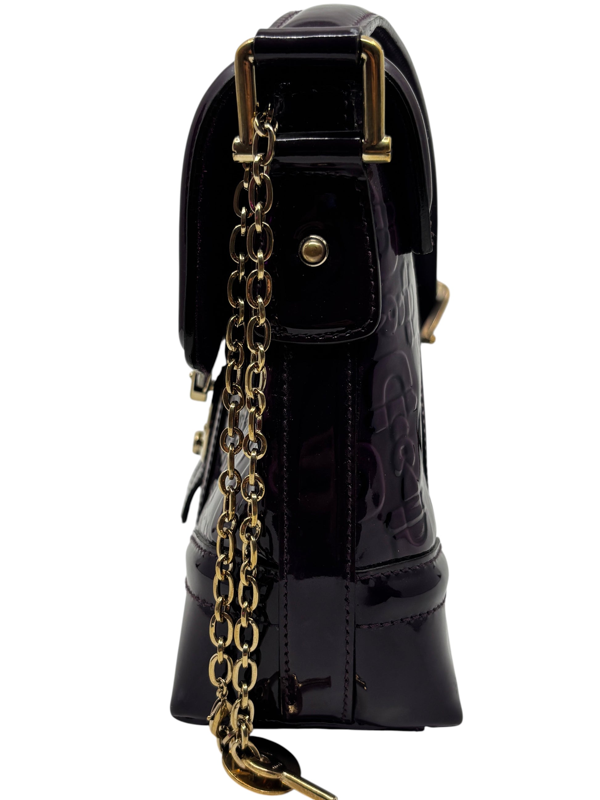 Posh Purse Co. preloved purple patent leather Gucci Horsebit Treasure bag side view with gold chain detail