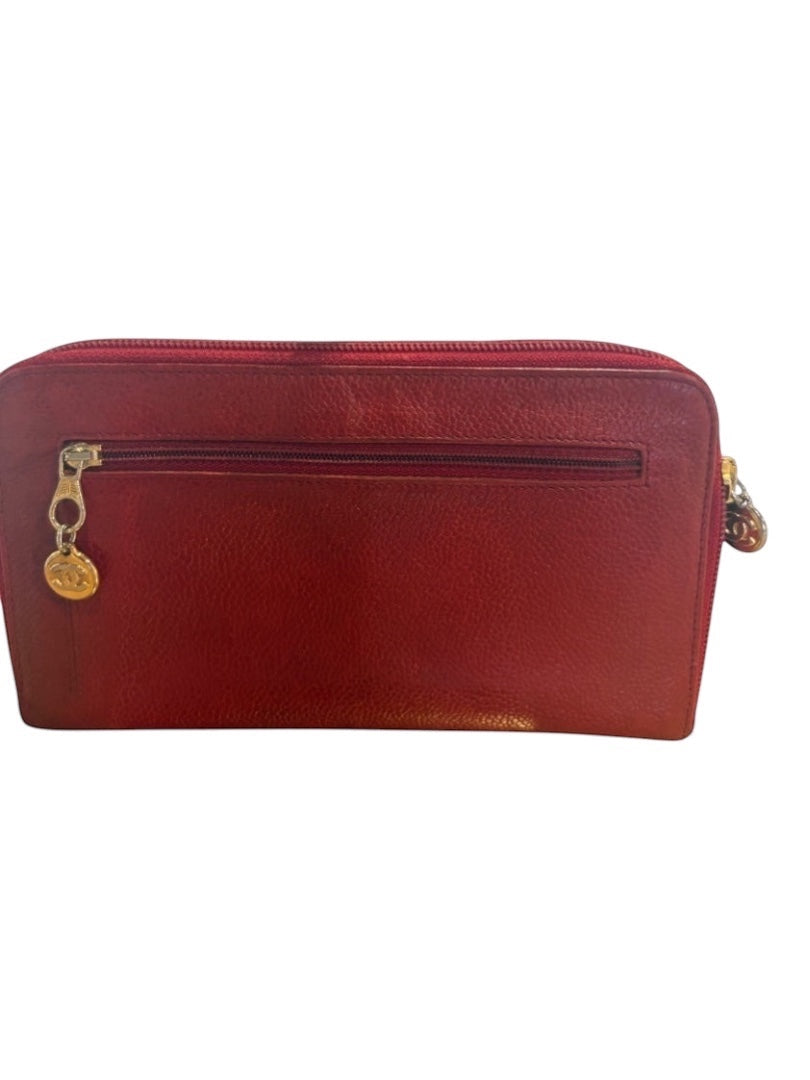 Posh Purse Co red vintage caviar leather Chanel zip around wallet with gold CC charm.