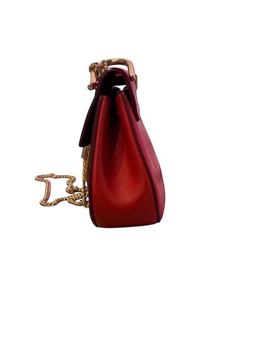 Posh Purse Co red leather Chloé Drew small saddle bag with gold hardware and chain strap.