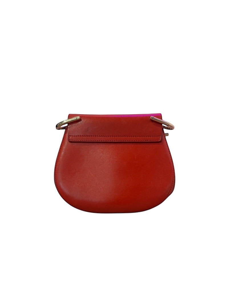 Posh Purse Co small red leather Chloe Drew bag with gold hardware and chain lock closure.