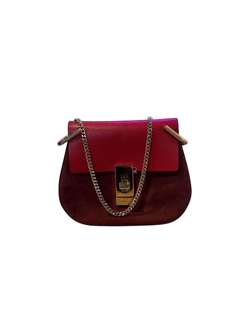 Posh Purse Co. small red leather and suede Chloe Drew bag with gold hardware and chain closure.