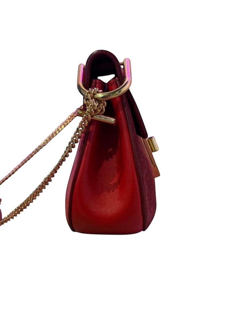 Posh Purse Co. small red leather and suede Chloé Drew bag with gold hardware and chain strap.