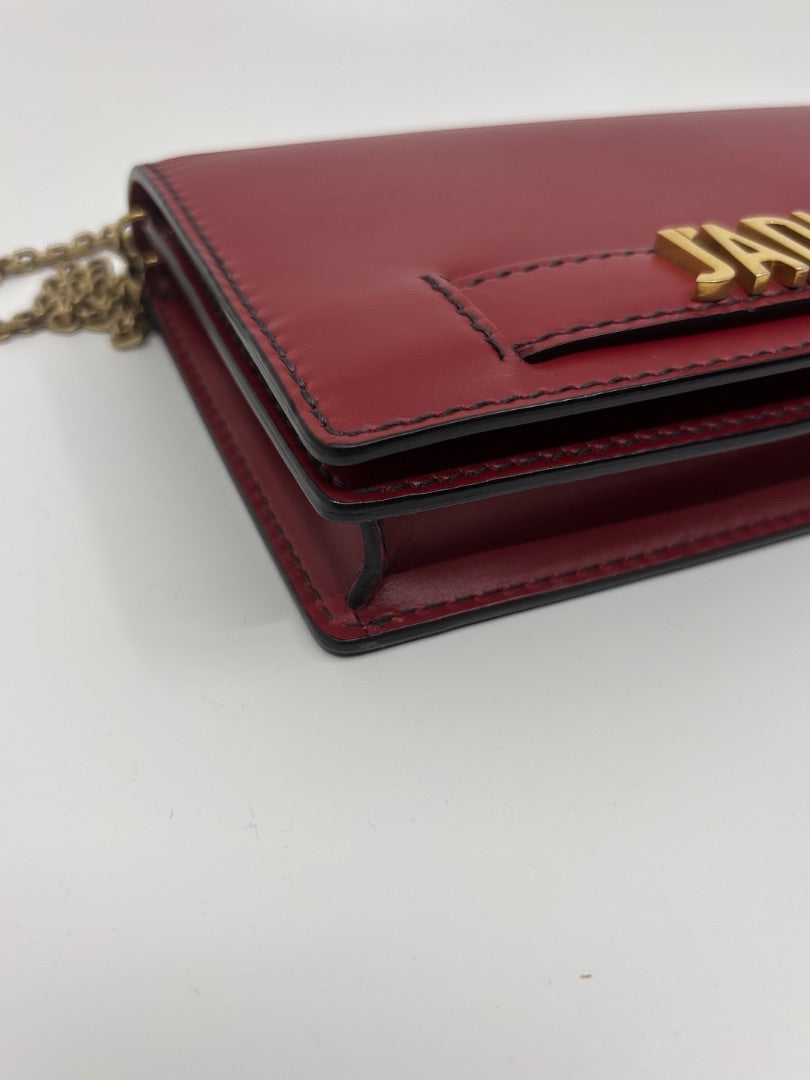 Posh Purse Co red Dior J'adior crossbody bag with gold-tone hardware and structured leather design.