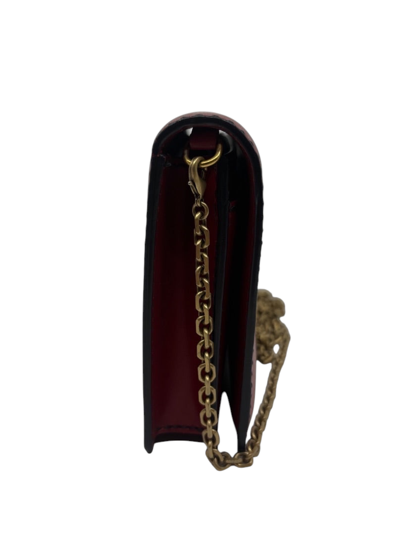Side profile of a red Dior J'adior crossbody bag with gold chain strap, sold by Posh Purse Co.