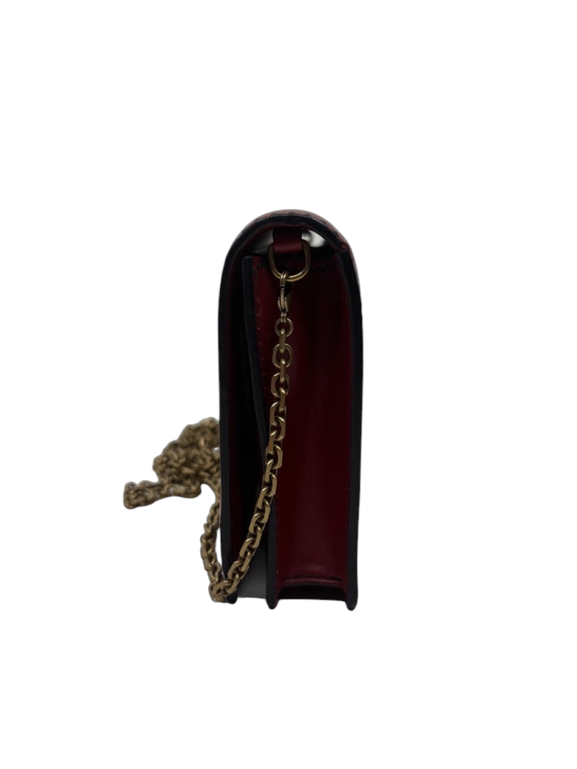 Side view of a red Dior J'adior crossbody bag with gold chain strap, available at Posh Purse Co.