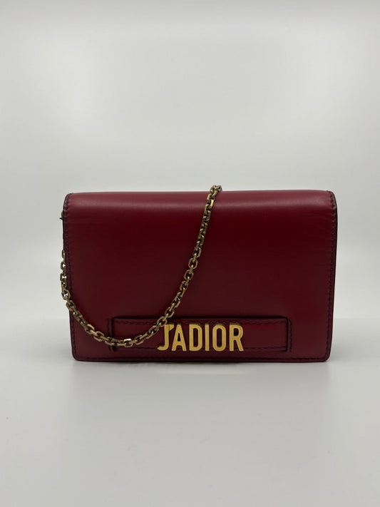 Posh Purse Co. preloved red Dior J'adior leather crossbody bag with gold-tone hardware and chain strap.
