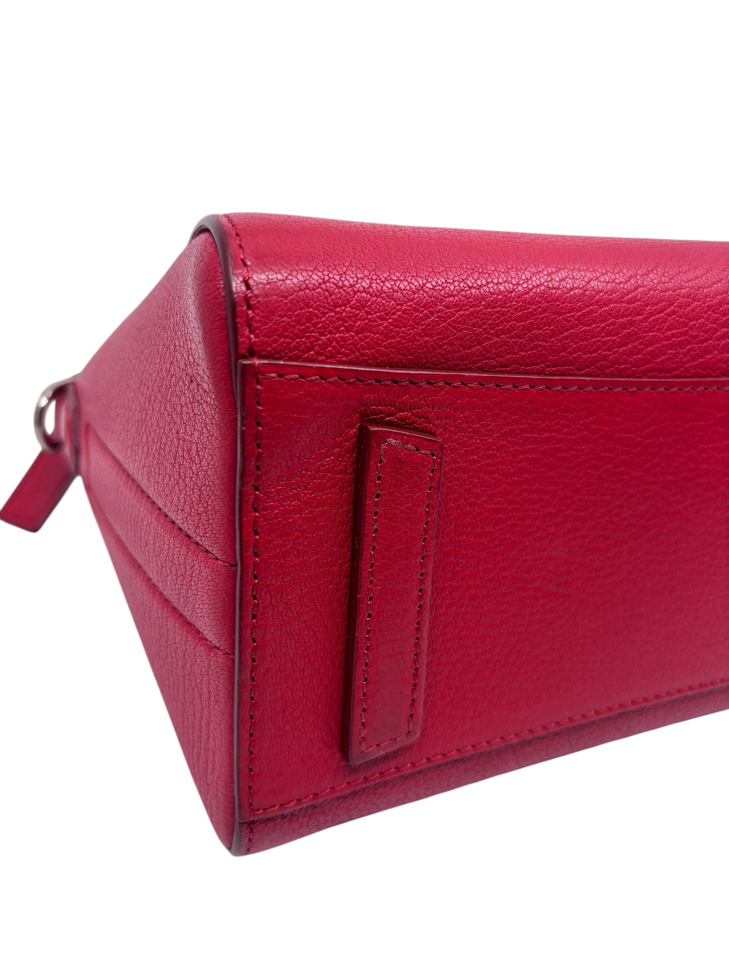 Posh Purse Co red Givenchy Mini Antigona handbag showing the textured leather base and structured side detail
