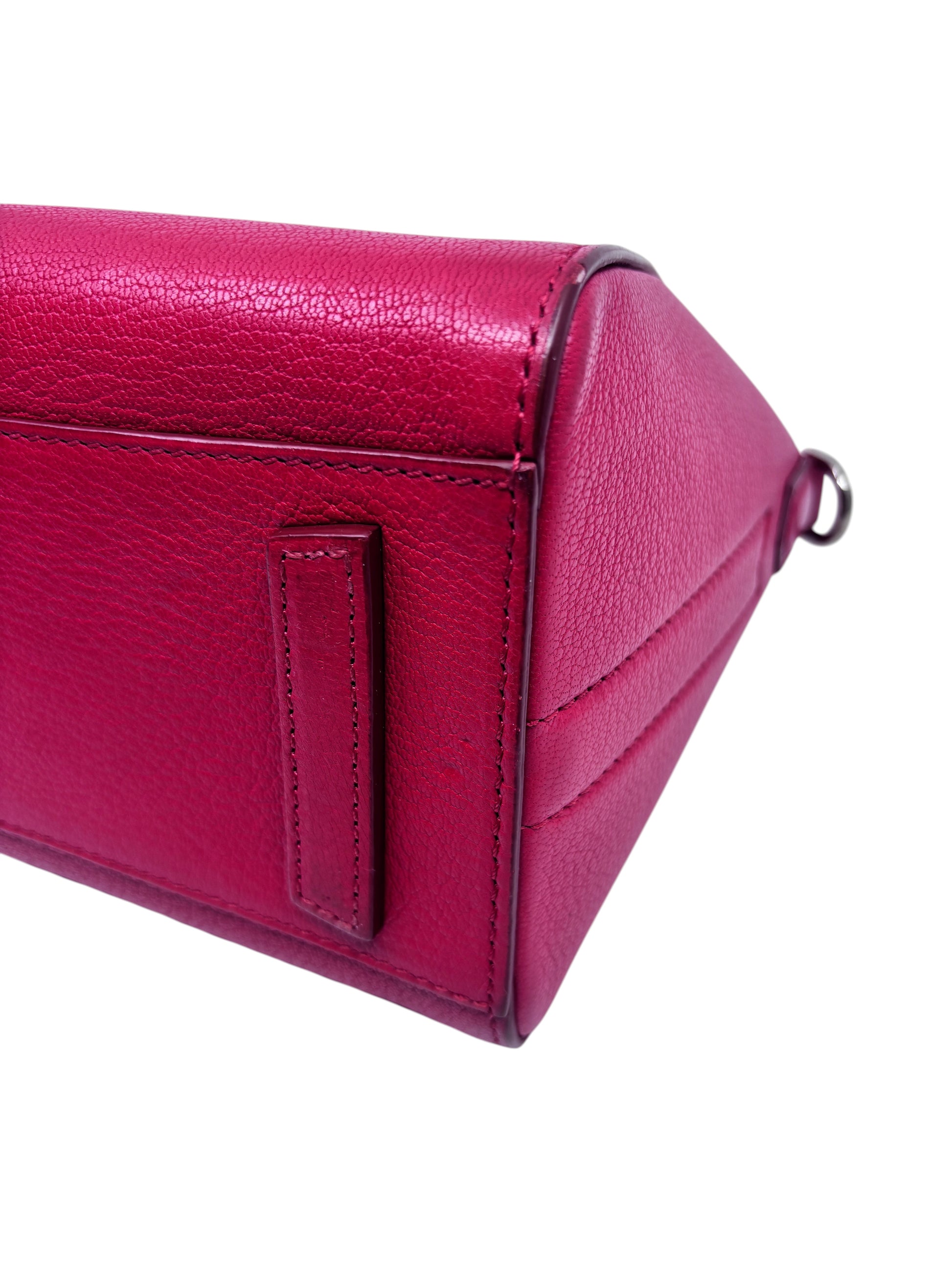 Posh Purse Co red Givenchy Mini Antigona handbag showing the textured leather side panel and structured base