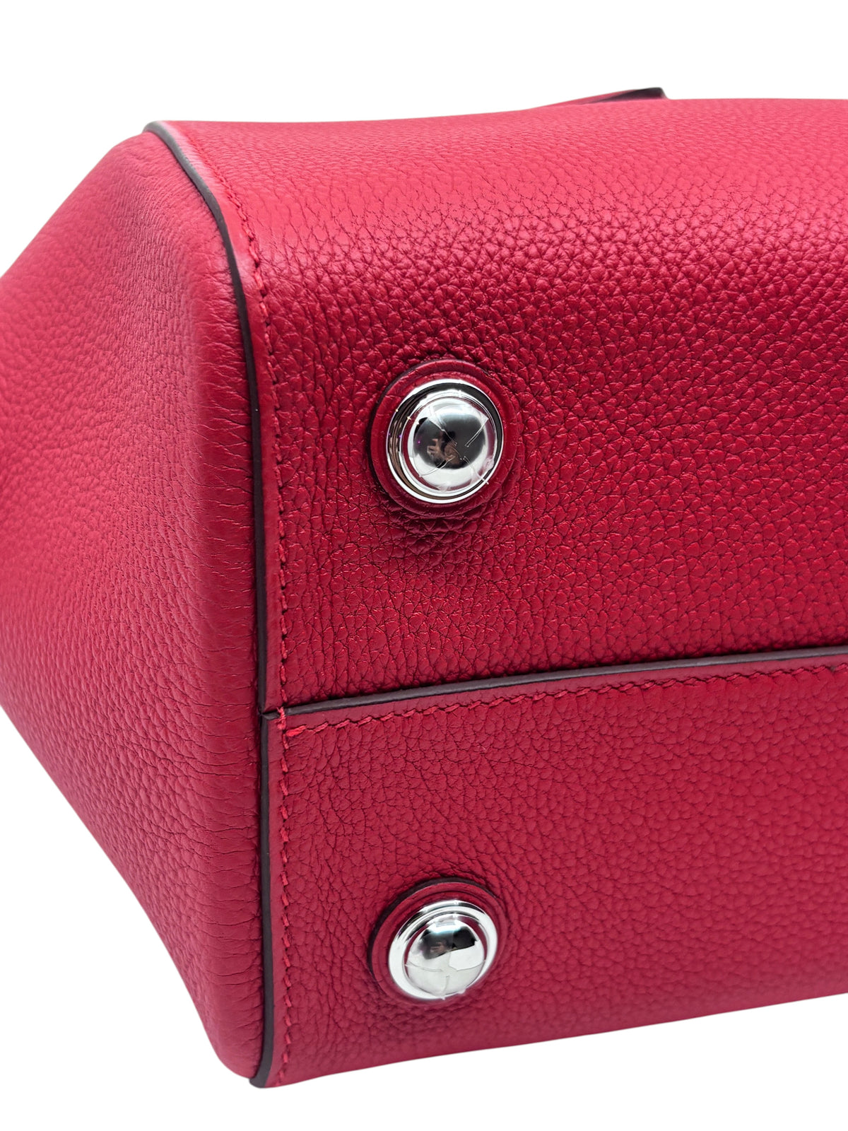 Posh Purse Co red Hermes Petit Tour 24 handbag featuring textured leather and polished silver-tone metal feet