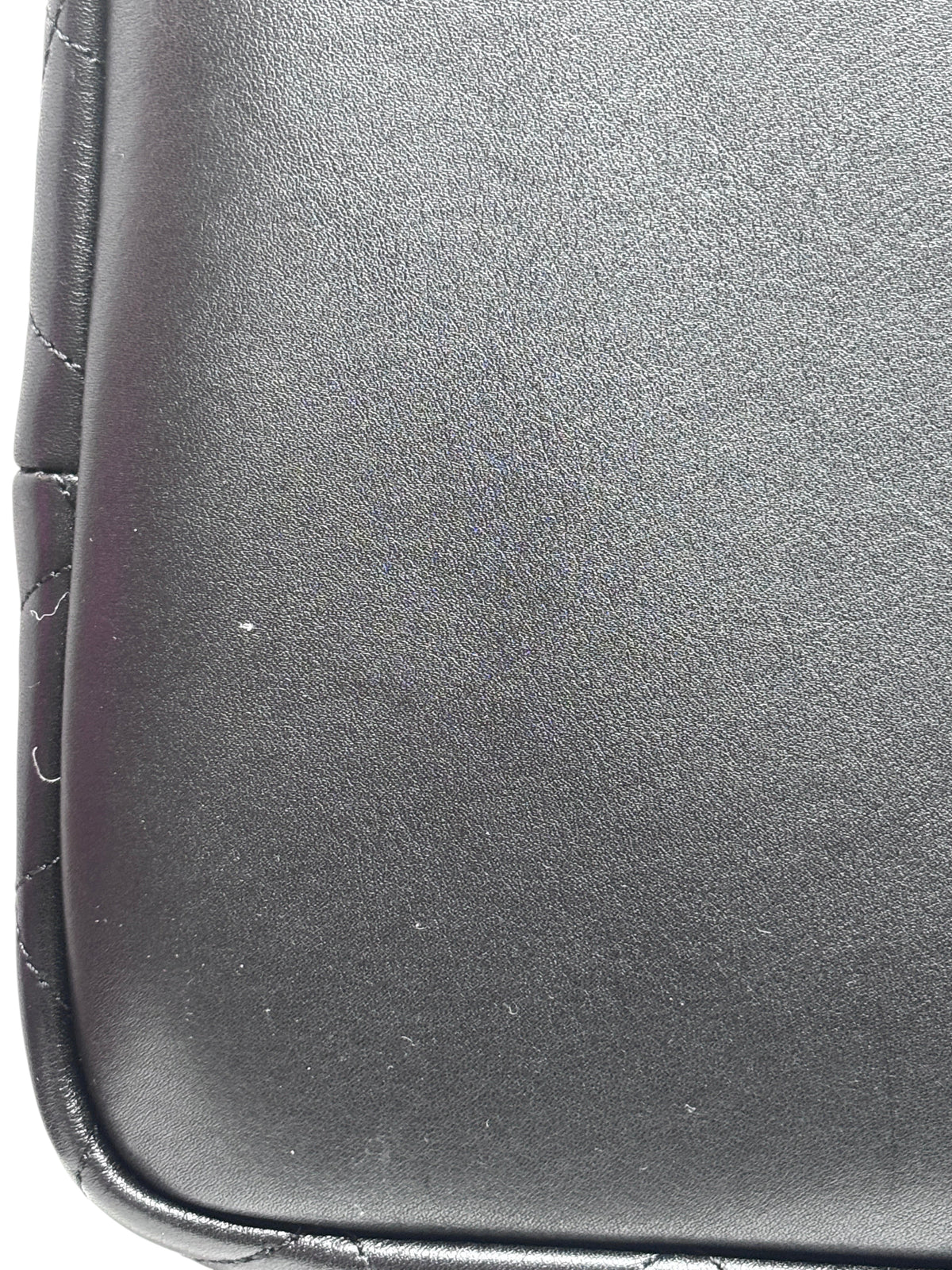 Close-up of the smooth black leather texture on a Posh Purse Co Saint Laurent ES Giant travel bag