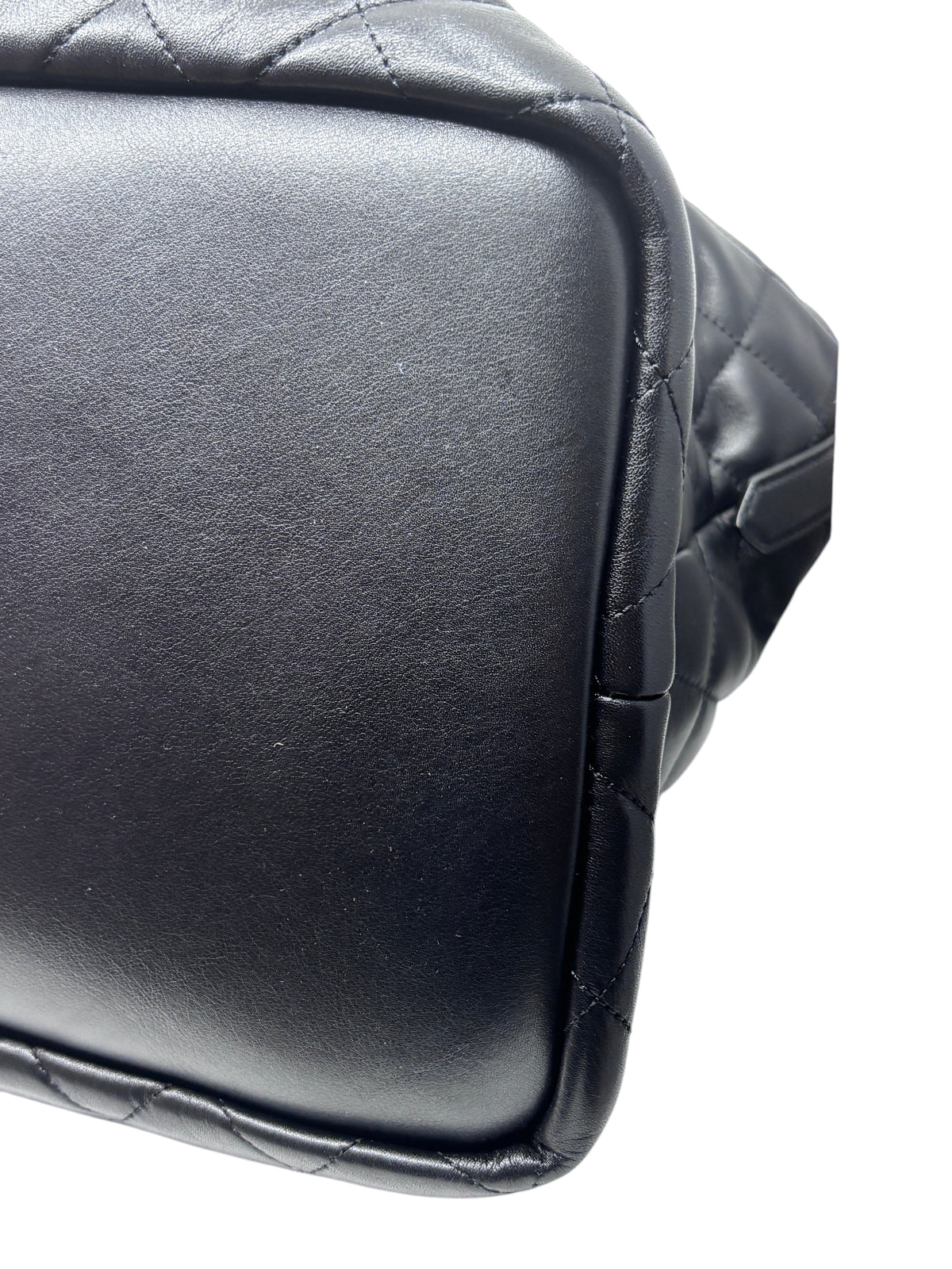 Posh Purse Co black Saint Laurent ES Giant travel bag base showing quilted leather texture and smooth bottom panel
