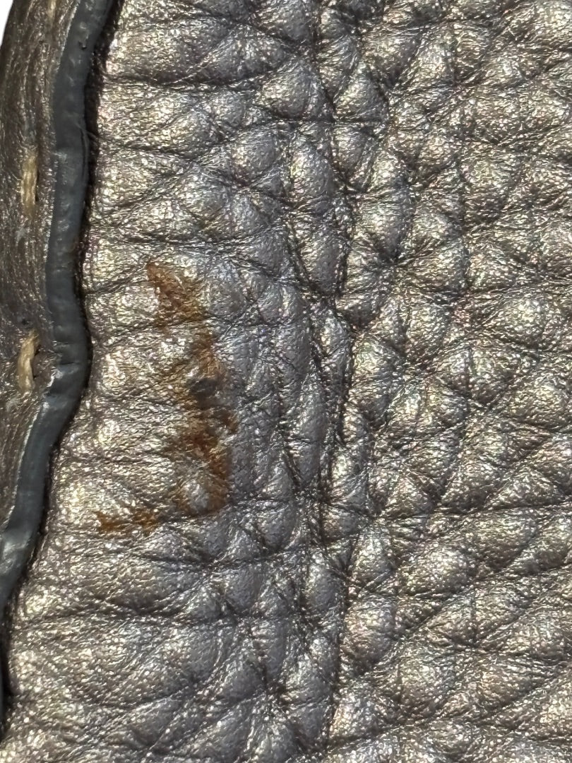 Posh Purse Co. preloved silver metallic leather Fendi Baguette handbag with textured quilting and visible surface wear.