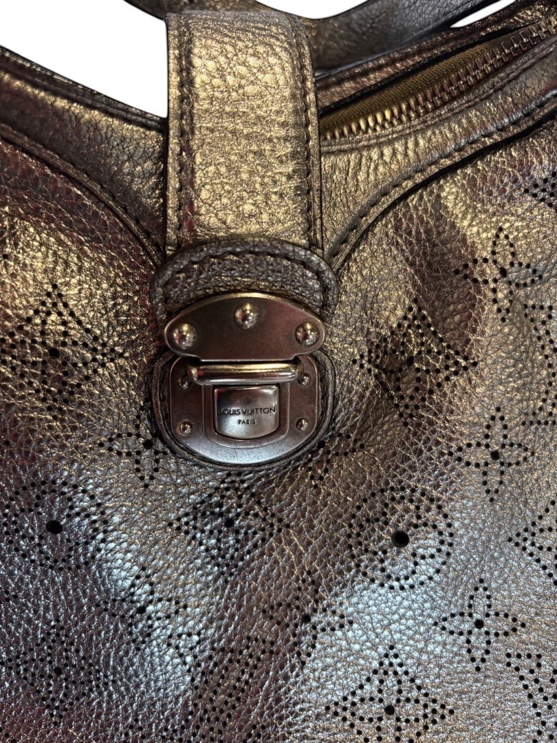 Posh Purse Co silver Louis Vuitton Mahina leather crossbody bag with perforated Monogram pattern and silver hardware.