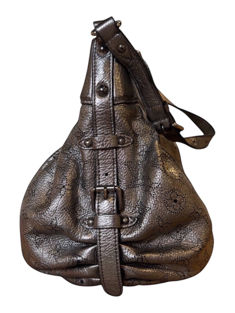 Posh Purse Co silver Louis Vuitton XS Mahina leather crossbody bag with Monogram perforation and adjustable strap.