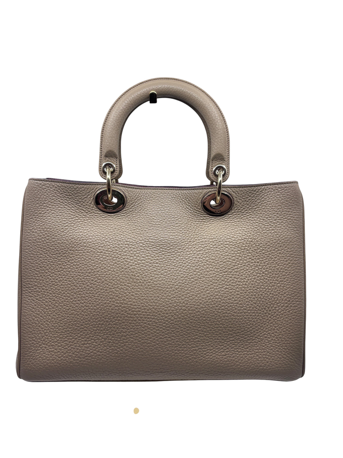 Posh Purse Co tan Dior Diorissimo leather tote with rolled handles and polished hardware on a display stand