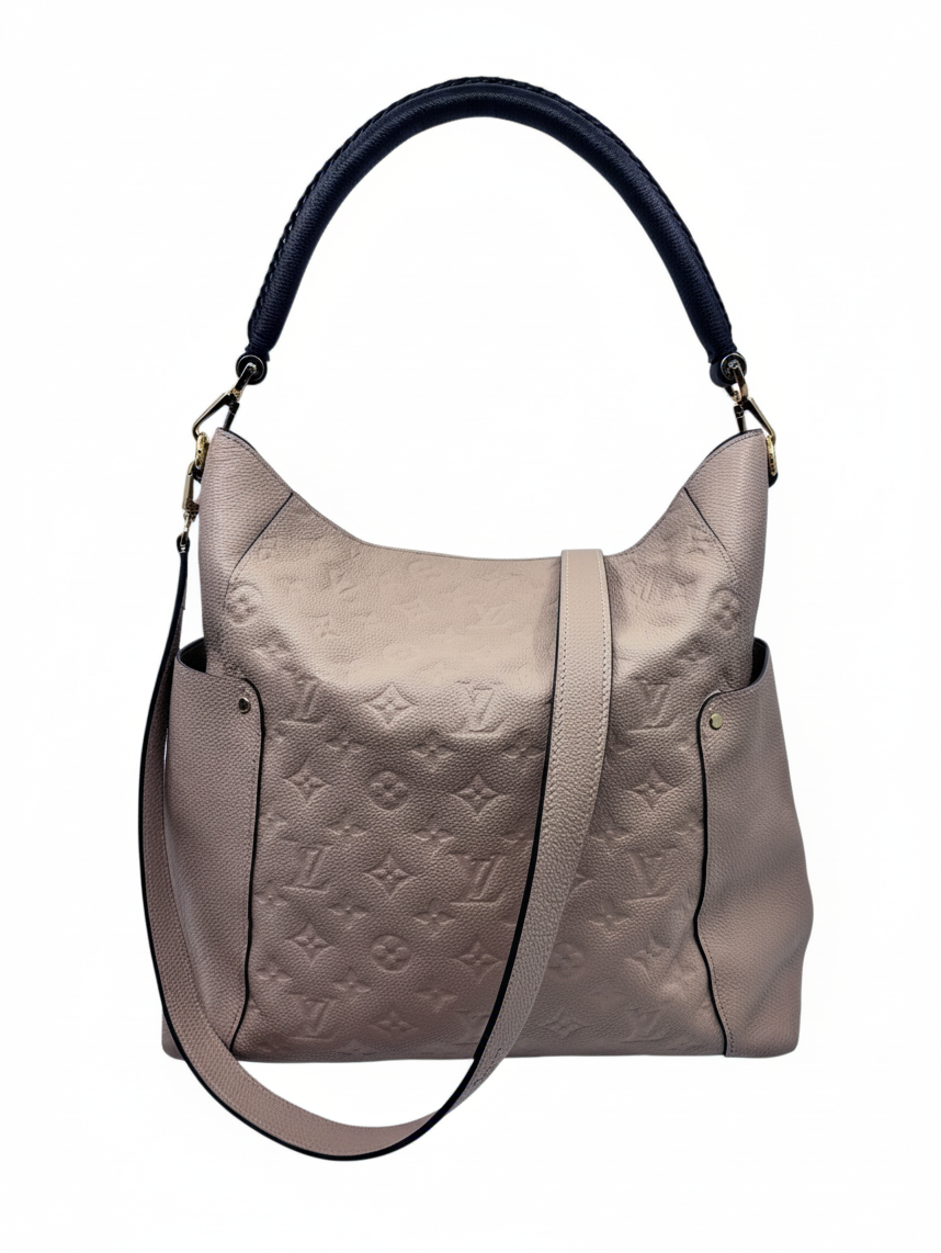Posh Purse Co tan Louis Vuitton Empreinte Bagatelle hobo bag with embossed monogram leather and gold-tone hardware