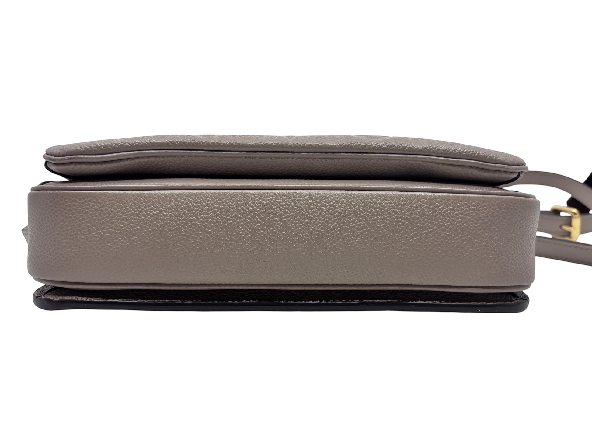 Posh Purse Co Louis Vuitton Pochette Metis in turtledove beige embossed leather, viewed from the side profile.