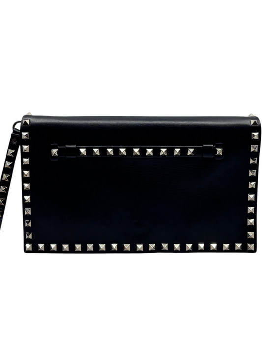 Posh Purse Co. black Valentino Garavani leather wristlet clutch featuring signature silver pyramid Rockstud detailing.