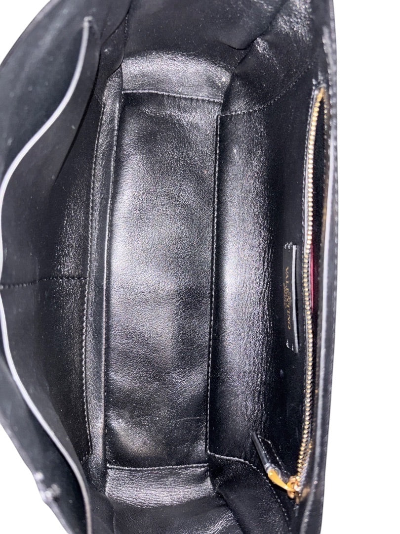 Posh Purse Co black nappa leather Valentino Roman Stud handbag interior with zip pocket and brand tag.